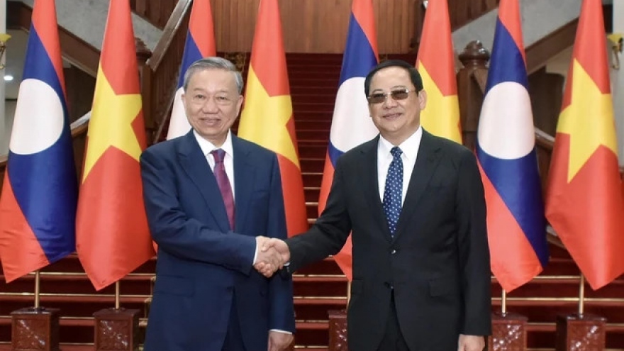 President To Lam meets Lao PM Sonexay Siphandone